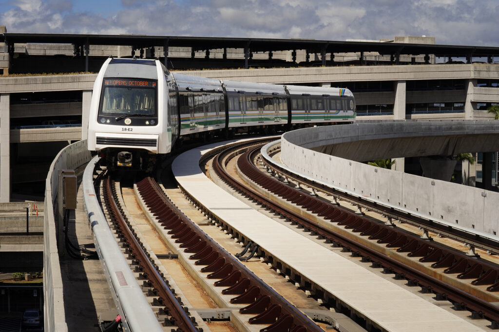 A Honolulu Authority for Rapid Transportation Skyline commuter train enters the Lelepaua - Daniel K. Inoue International Airport station along with a new section of the Skyline route Thursday, Oct. 9, 2025, in Honolulu. (Kevin Fujii/Civil Beat/2025)