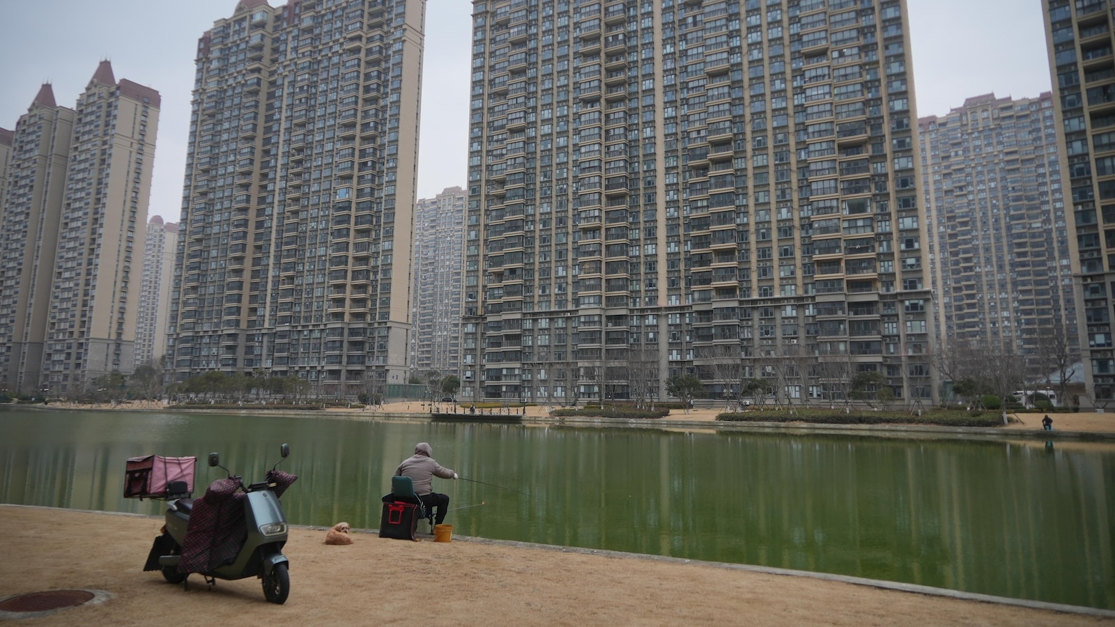 As China's economy slows, some are snapping up cheap homes to 'retire' early