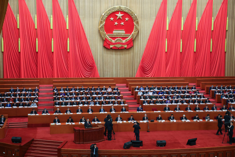 Chinese Premier Li Qiang delivers a work report during the opening session of the National People's Congress (NPC) at the Great Hall of the People in Beijing.