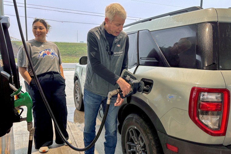 US Energy Secretary Chris Wright pumps gas at a gas station in Corpus Christi, Texas.