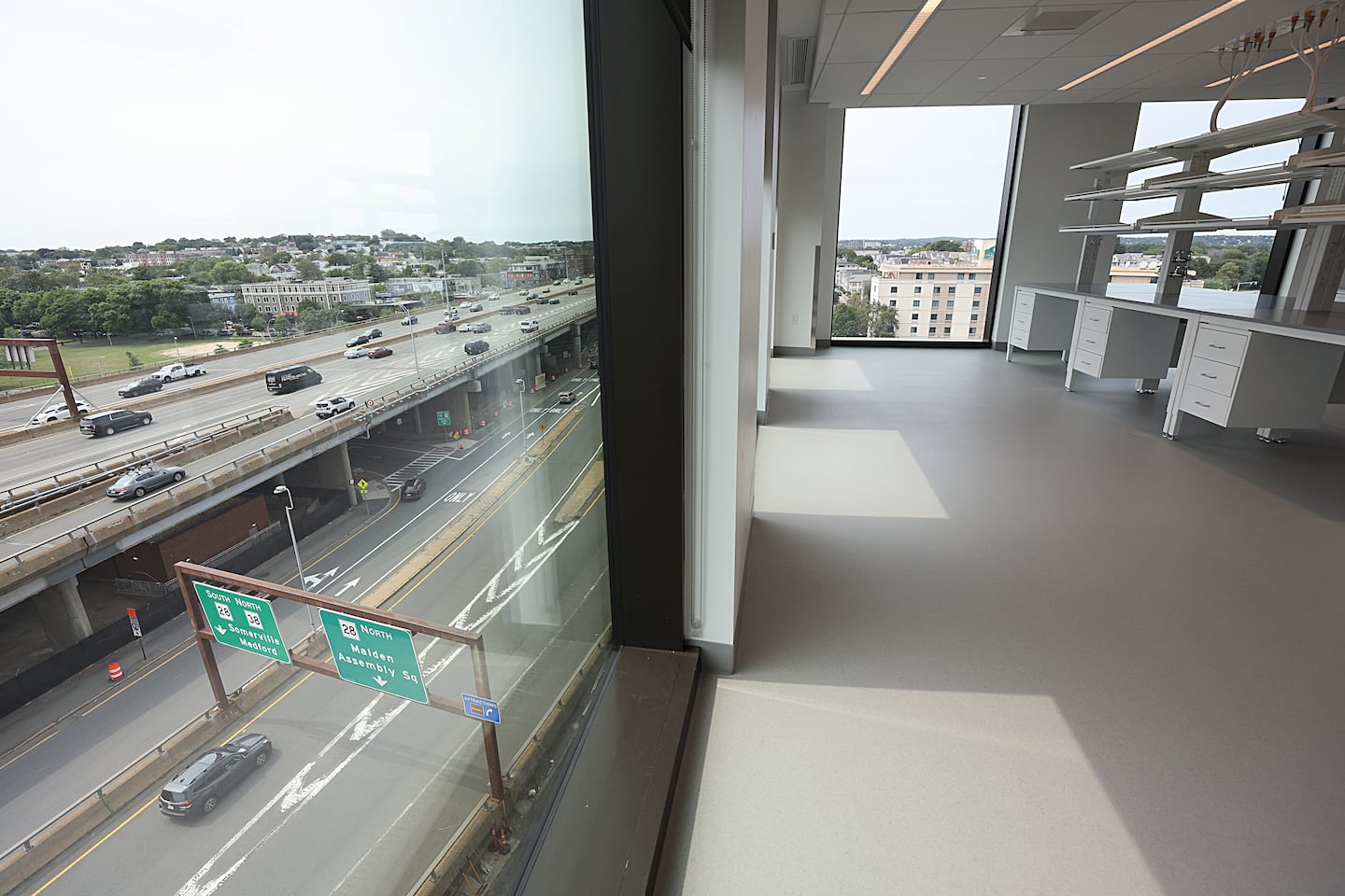An empty lab tower overlooks Interstate 93 in Somerville.